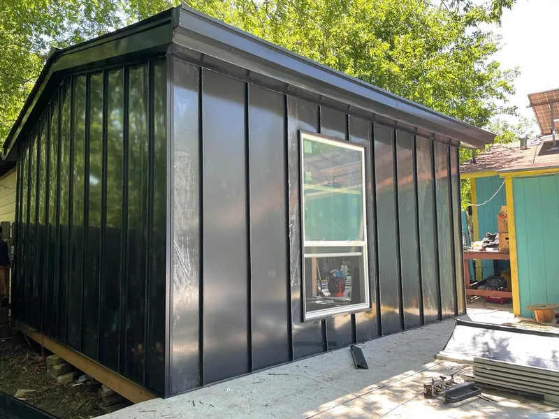 Black standing seam metal wall panels for Roof Inspection in Bozeman