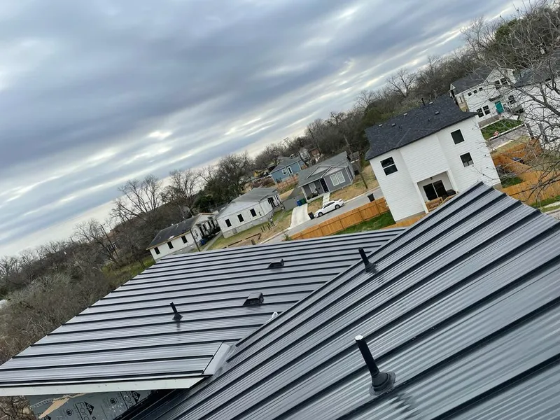 Standing seam metal roof panels with vents for Skylight Repair in Bozeman
